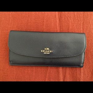 It’s NAVY BLUE but looks black. Brand new.